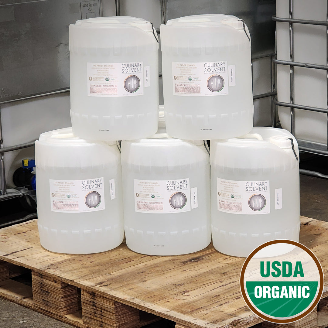 Pure 190 Proof Food Grade Ethanol 5 gallon jugs  by Culinary Solvent for tincture, perfuming, and more on a pallet in distillery shipping area