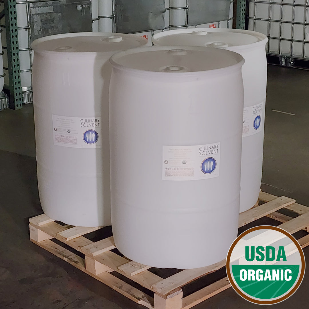 55 gallon drums of USDA organic 200 proof food grade ethanol on a pallet ready to ship