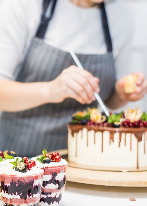baker flavoring and decorating cakes using pure 200 proof alcohol by Culinary Solvent food grade ethanol